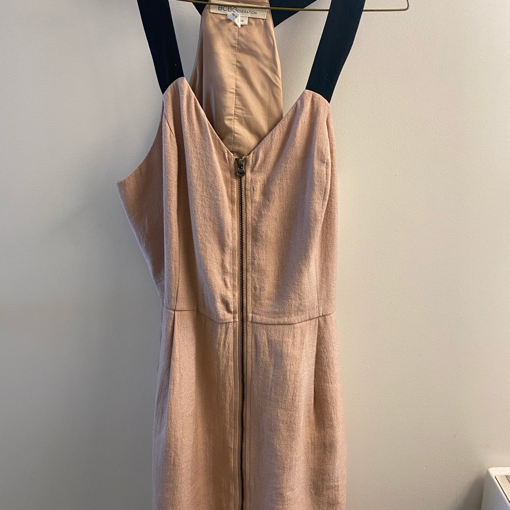 Gently worn pink BCBG dress. Size 10 with black straps.